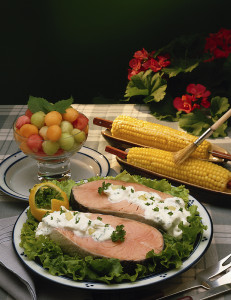 Fish with fruit and corn on side