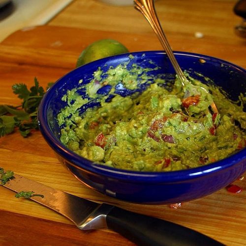 Guacamole with knife