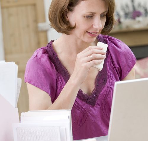 Women eating at her desk