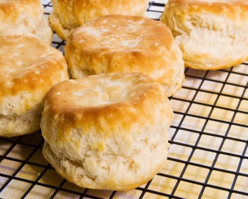 Baked biscuits on cooling rack