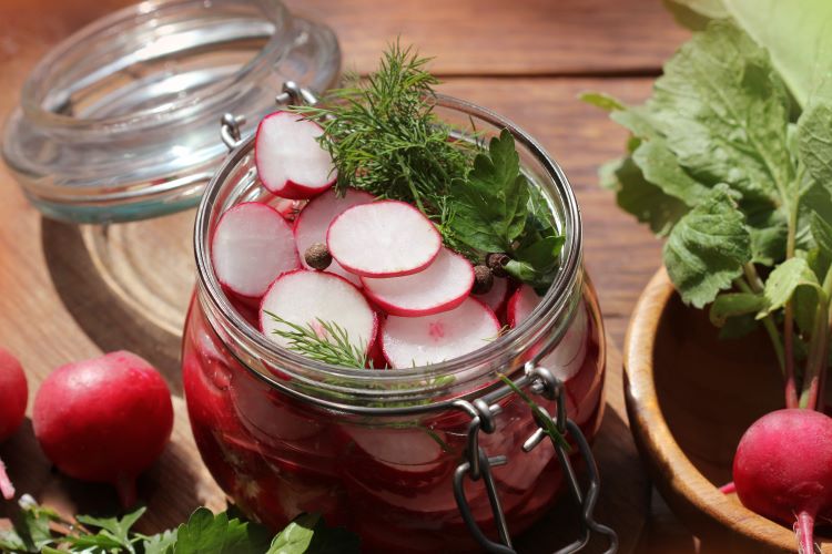 pickled radishes in glass jar
