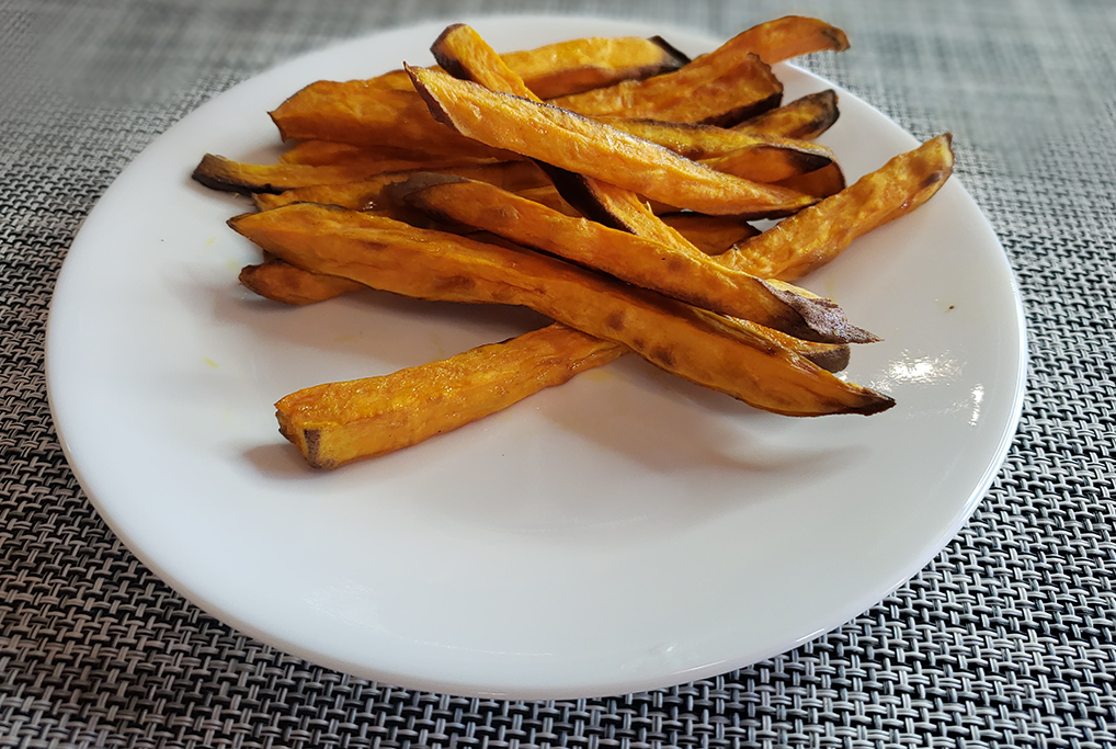 piles of fries on white plate