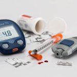 Blood glucose test kit, medications, needle, and blood strips