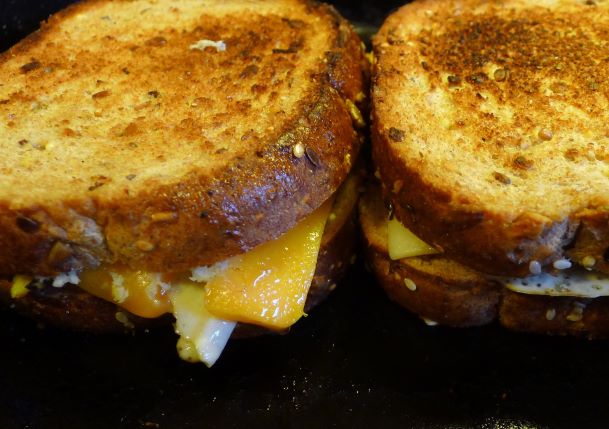 two grilled cheese sandwiches