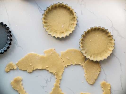 pastry cups lined with pastry dough