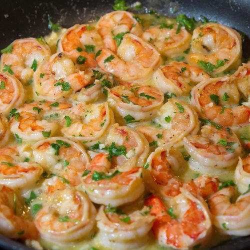 shrimp scampi in frying pan